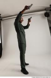 Adult Average Black Fighting with gun Standing poses Casual